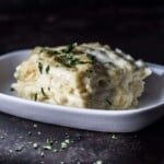 Gouda macaroni and cheese layered in lasagna noodles and cheesy sauce then baked cheese on top