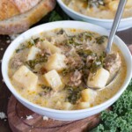Zuppa Soup with potatoes, sausage and kale in a creamy broth in a bowl