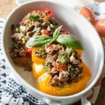 Italian Style Stuffed Paleo Peppers, are made with sweet bell peppers stuffed with Italian herbs and organic beef to create a delicious and healthy one-dish paleo meal for your family.