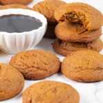 Soft and Chewy Blackstrap Molasses Cookies with bowl of molasses