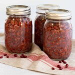 Red beans that have been canned in Pint jars and sealed in a pressure cooker