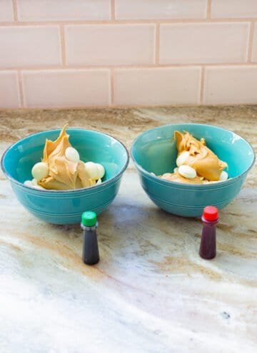 Christmas Muddy Buddy Recipe, aka Reindeer Chow food coloring and bowls of peanut butter