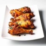 crispy air fryer chicken legs on a plate