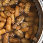 boiled peanuts that have been cooked and they're sitting in juices