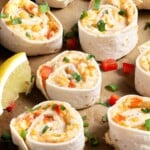 Crab pinwheels with hot cheese and crab meat wrapped in flour tortilla.