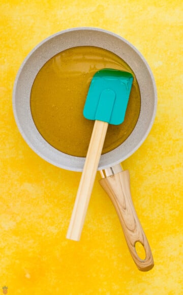 honey in a pan with spatula in the honey