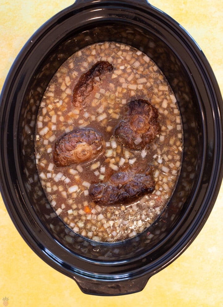 oxtail stew ready to cook in the slow cooker
