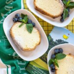 famous pound cake with mint and blueberries on plates, masters towel and masters spectator guide