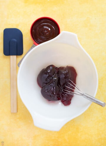 grape jelly in bowl, bbq sauce and spatual