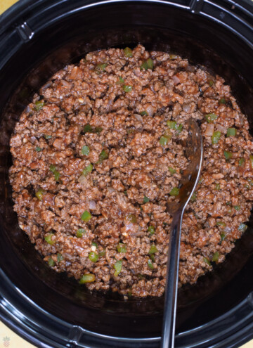 slow cooker filled with sloppy joe ready to cook