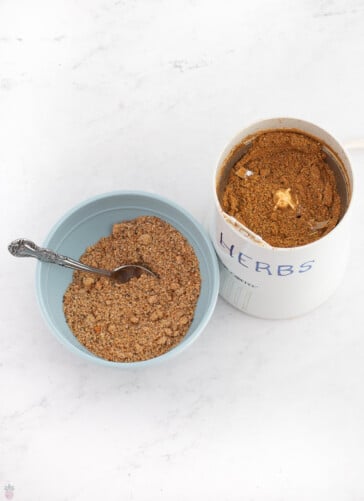 turkey dry rub in a spice grinder and in a small bowl ready to rub on a turkey