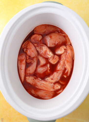 raw chicken tocino in the crockpot ready to cook