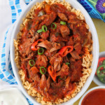 Steak Picado over rice with smoky tomato sauce and steak