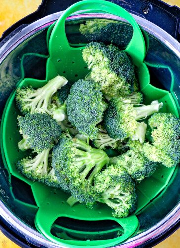Cut broccoli inside of a steamer basket which is set in an instant pot