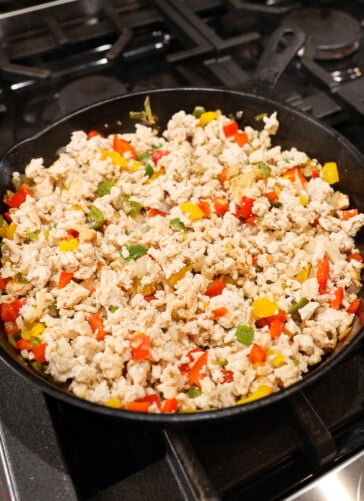 ground turkey and peppers, onions, garlic all cooked together in a skillet