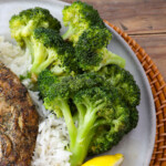 Fresh, steamed broccoli drizzled with garlic herb butter sauce.