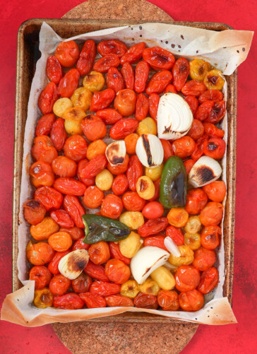 pan of cherry tomatoes, onions, jalapeno roasted and charred
