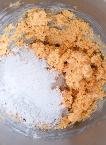 Cheese straw mixture cream together and flowers sprinkle them