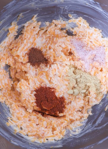 Creamed butter and cheeses with seasoning sprinkled on top