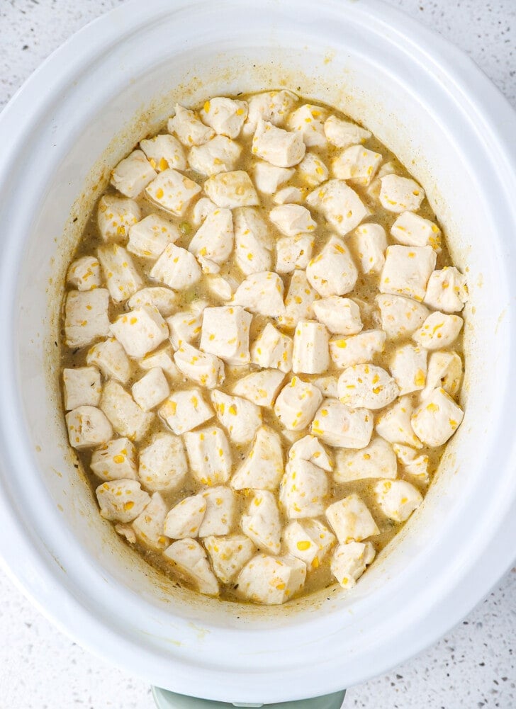 A Crock-Pot full of chicken and dumplings that are dough