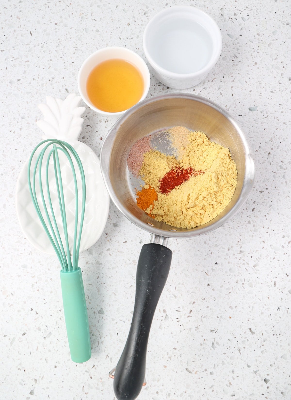 Dry homemade mustard ingredients in a pan