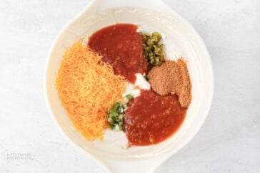 Ingredients in a bowl of cream cheese salsa