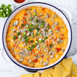 buffalo chicken dip topped with blue cheese crumbles