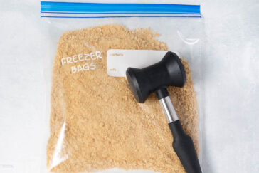 gram cracker crumbs in ziplock bag with meat mallet to break them.