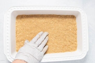 pressing gram cracker crust in 9x13