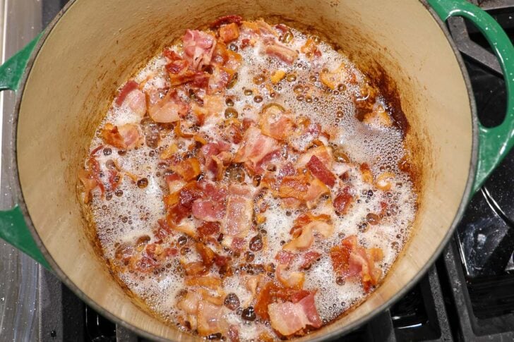 frying bacon in a pan