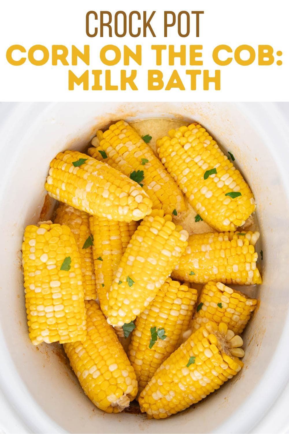 Corn on the cob pieces in a white crock pot, garnished with parsley, with the text “Crock Pot Corn on the Cob: Milk Bath” written above the image.