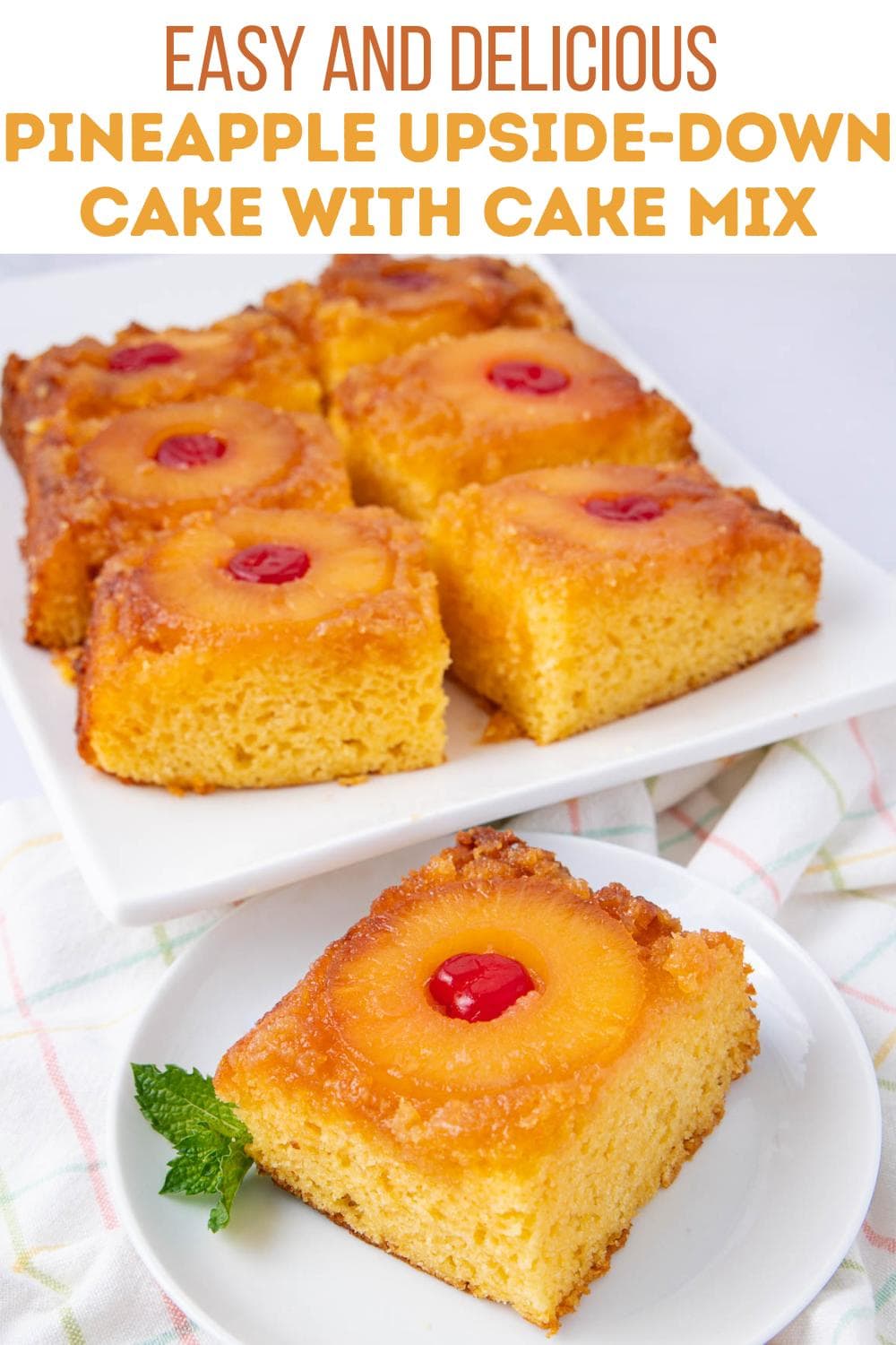 Six slices of pineapple upside-down cake with a cherry in the center of each are arranged on a white plate, with one slice served separately on a napkin, garnished with a mint leaf. Text above describes the dessert.