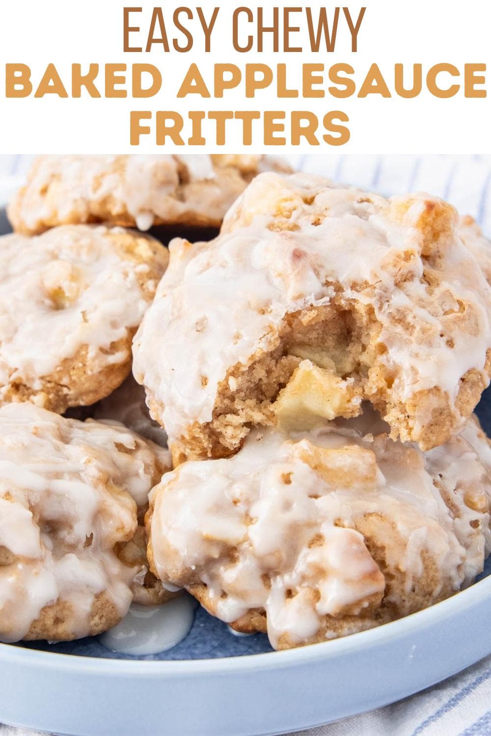 A plate of glazed baked applesauce fritters is shown, with one fritter broken open to reveal chunks of apple inside. The top of the image reads "Easy Chewy Baked Applesauce Fritters" in large, bold text.