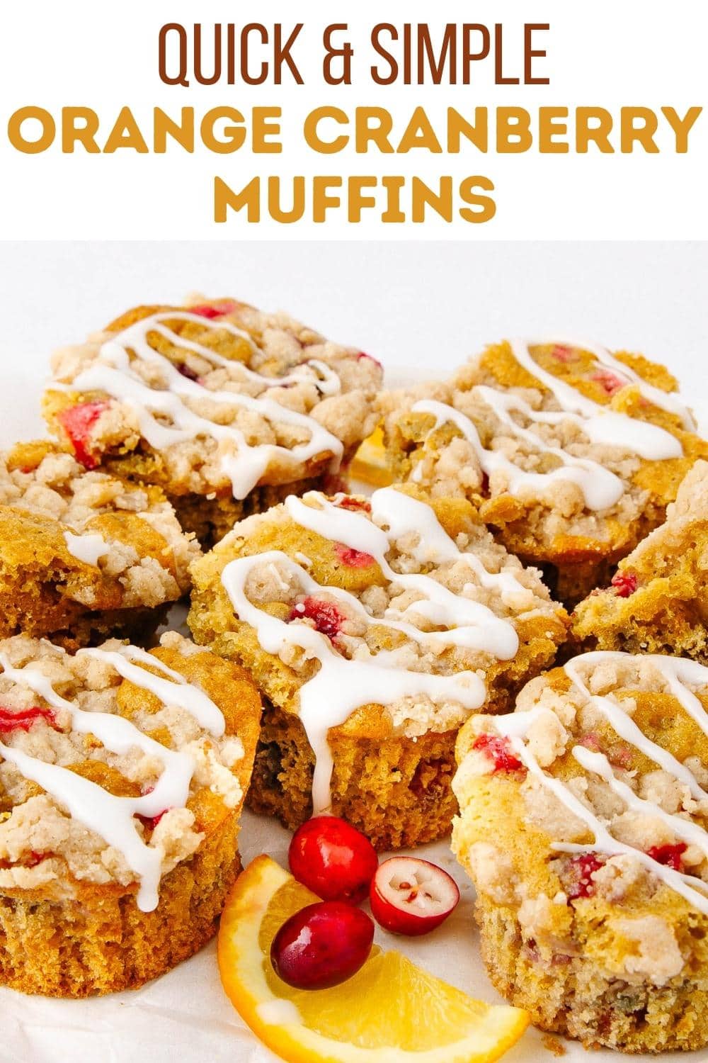 A group of orange cranberry muffins topped with white icing are arranged on a white surface. Garnishes of fresh cranberries and an orange slice are placed in front of the muffins. Text above reads "Quick & Simple Orange Cranberry Muffins.