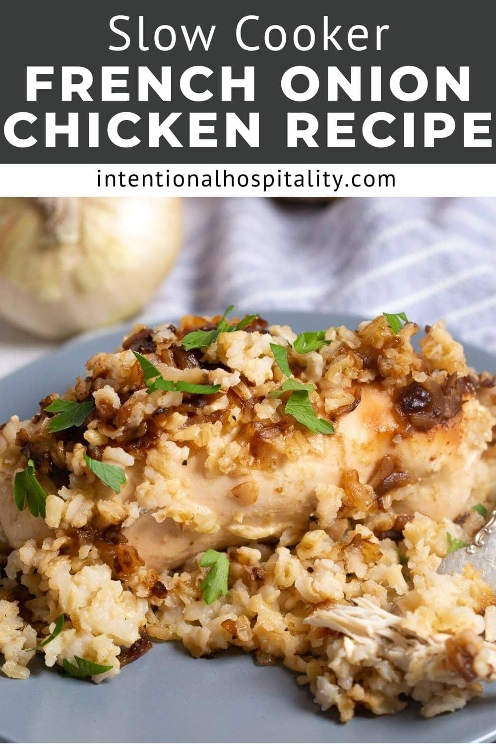 A plate of French onion chicken served with rice and garnished with chopped herbs sits in front of an onion. Text above reads "Slow Cooker French Onion Chicken Recipe – intentionalhospitality.com".