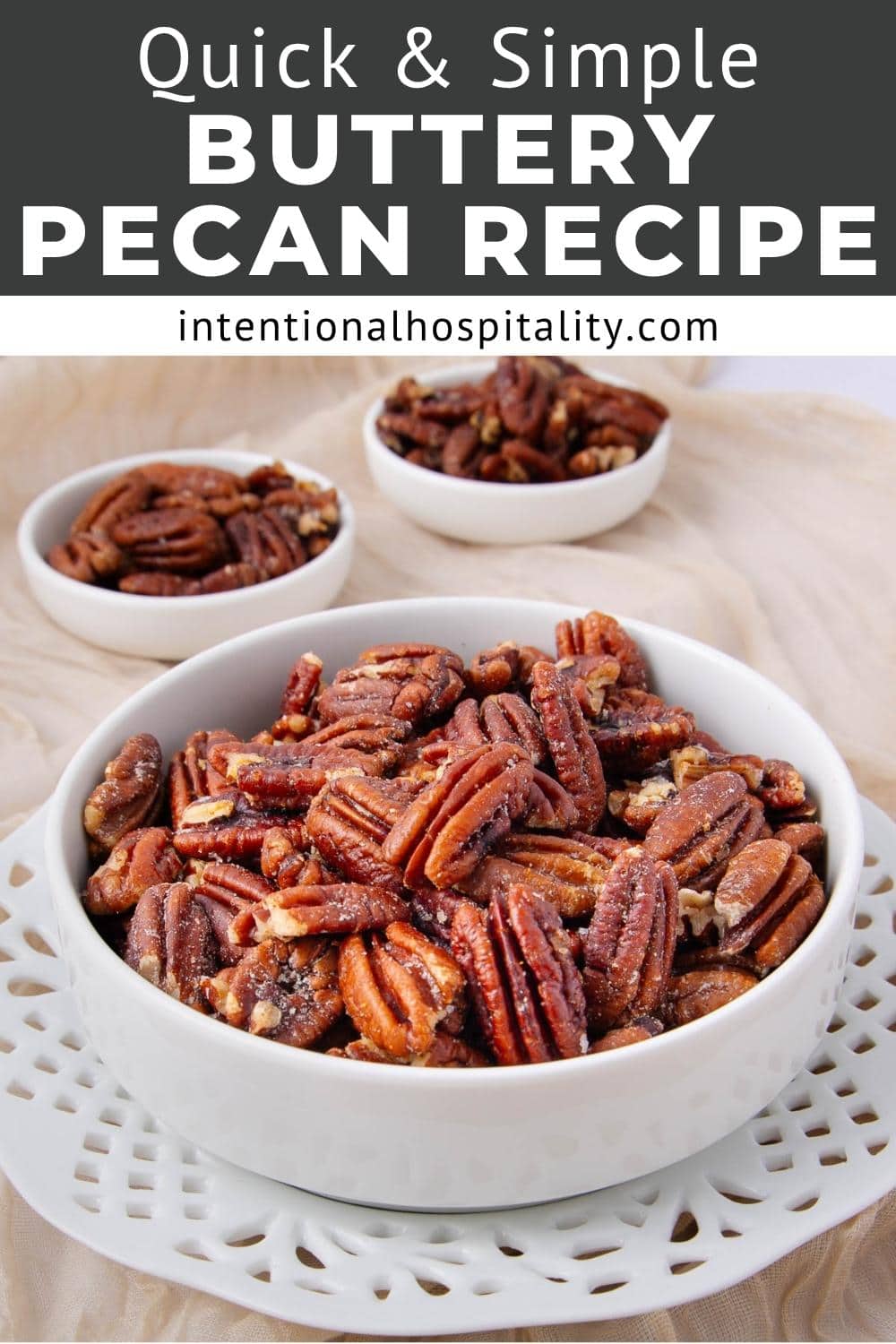 A white bowl filled with glazed pecans sits on a decorative plate, with two smaller bowls of pecans in the background. Text above reads "Quick & Simple Buttery Pecan Recipe intentionalhospitality.com.