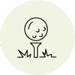 A simple line drawing of a golf ball on a tee, with small tufts of grass at the base, set against a light circular background.