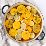 A pot of lemons and oranges.