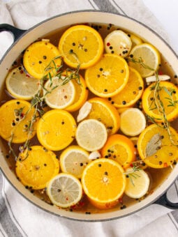 A pot of lemons and oranges.